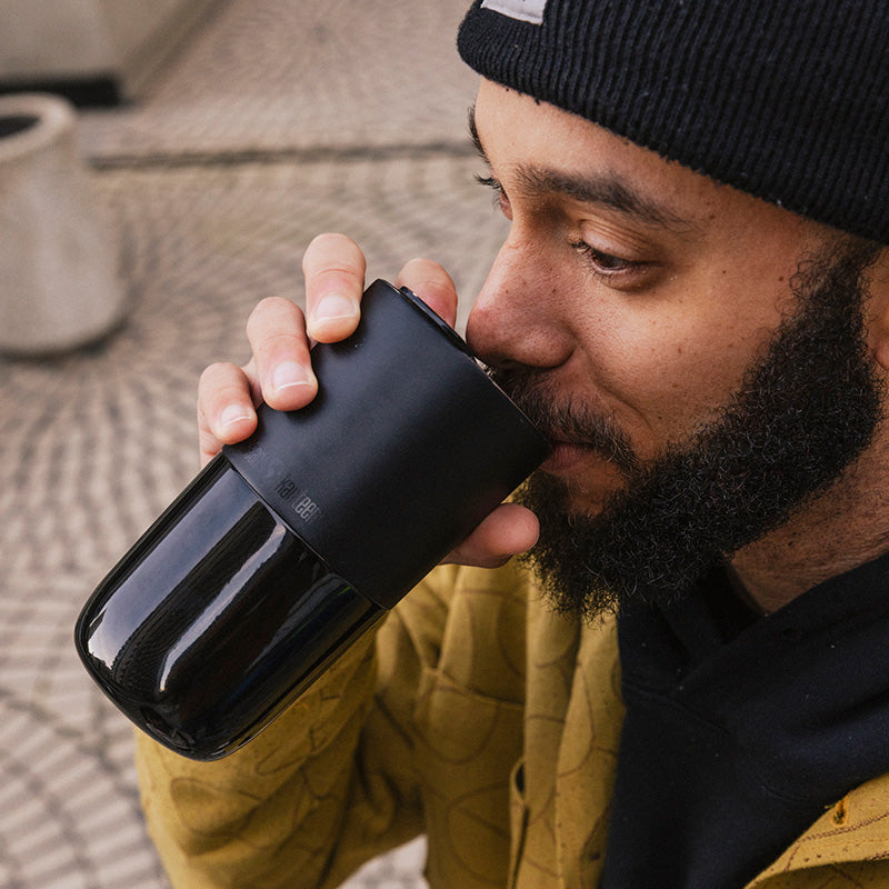 16oz-rise-tumbler-k4 16oz_rise_tumbler_black_man_drink_square.jpg