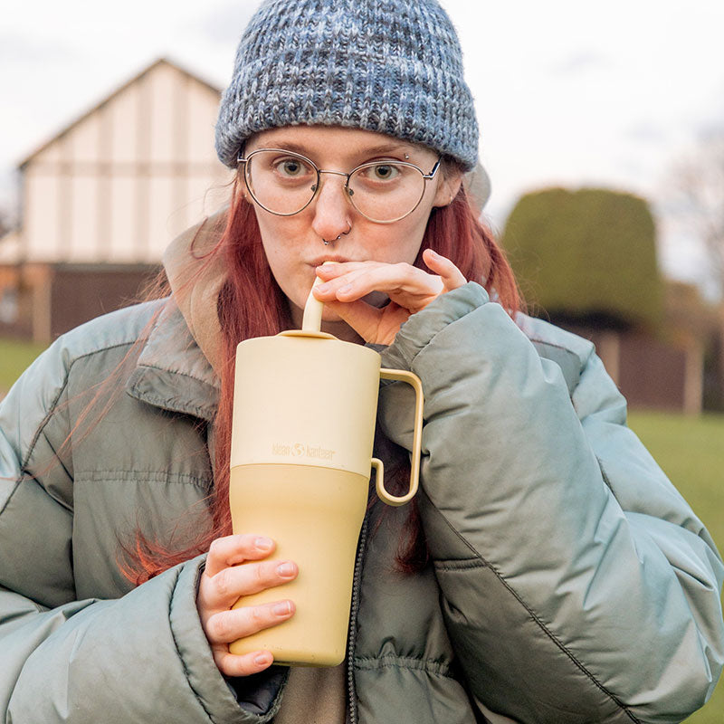 26oz-rise-tumbler-with-straw-lid-t8 26oz_rise_rumbler_straw_wax_yellow_woman_sip_square.jpg