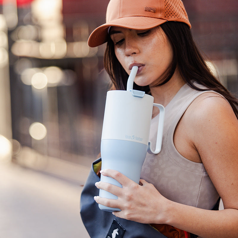 36oz-rise-tumbler-with-straw-lid-a0 36oz_rise_tumbler_straw_girl_sip_square.jpg