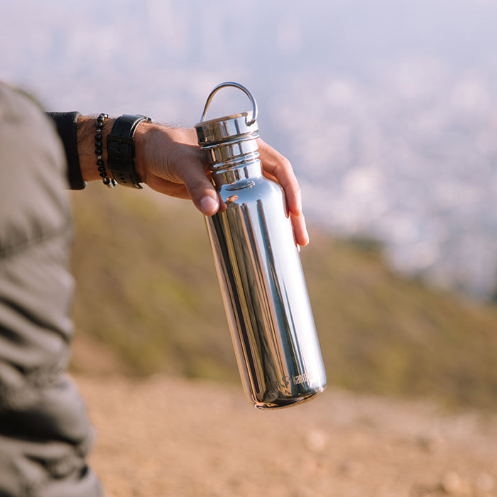 27oz-reflect-with-bamboo-cap-c5 K27SSLRF-MS-BAMBOO_reflect_bottle_hand_lifestyle.jpg