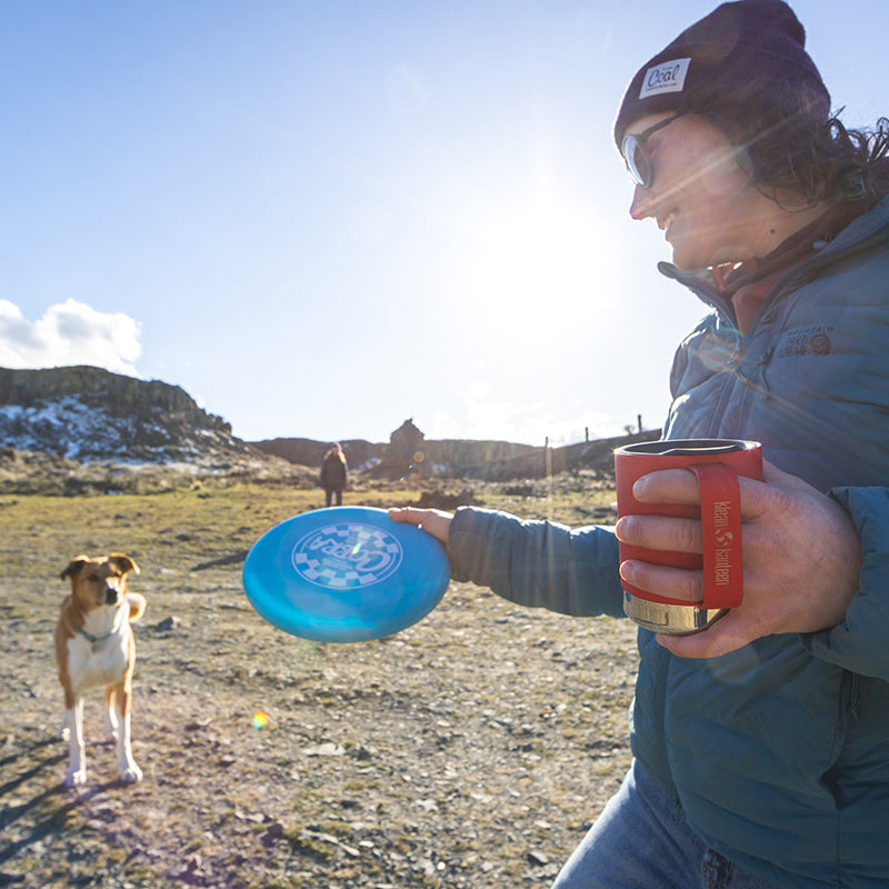 12oz-camp-mug-a4 insulated_camp_mug_12oz_woman_dog_frisbee_square.jpg